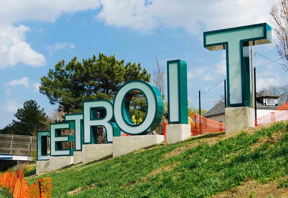 Featured image for the Detroit sign talk, Belle Isle trash robot and Tigers early season review podcast.