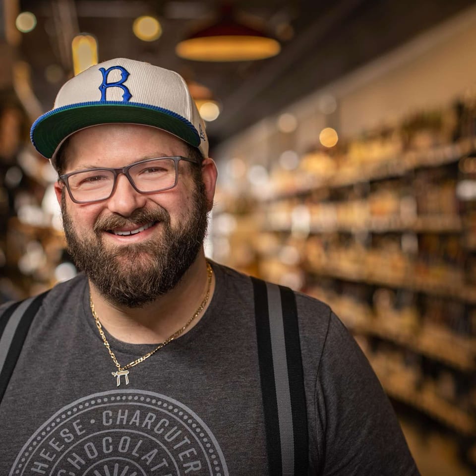 Featured image for the What is a Cheesemonger? (ft. Zach Berg) podcast.